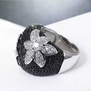 Black and white CZ Floral cocktail band ring sizes 6 and 10 available
